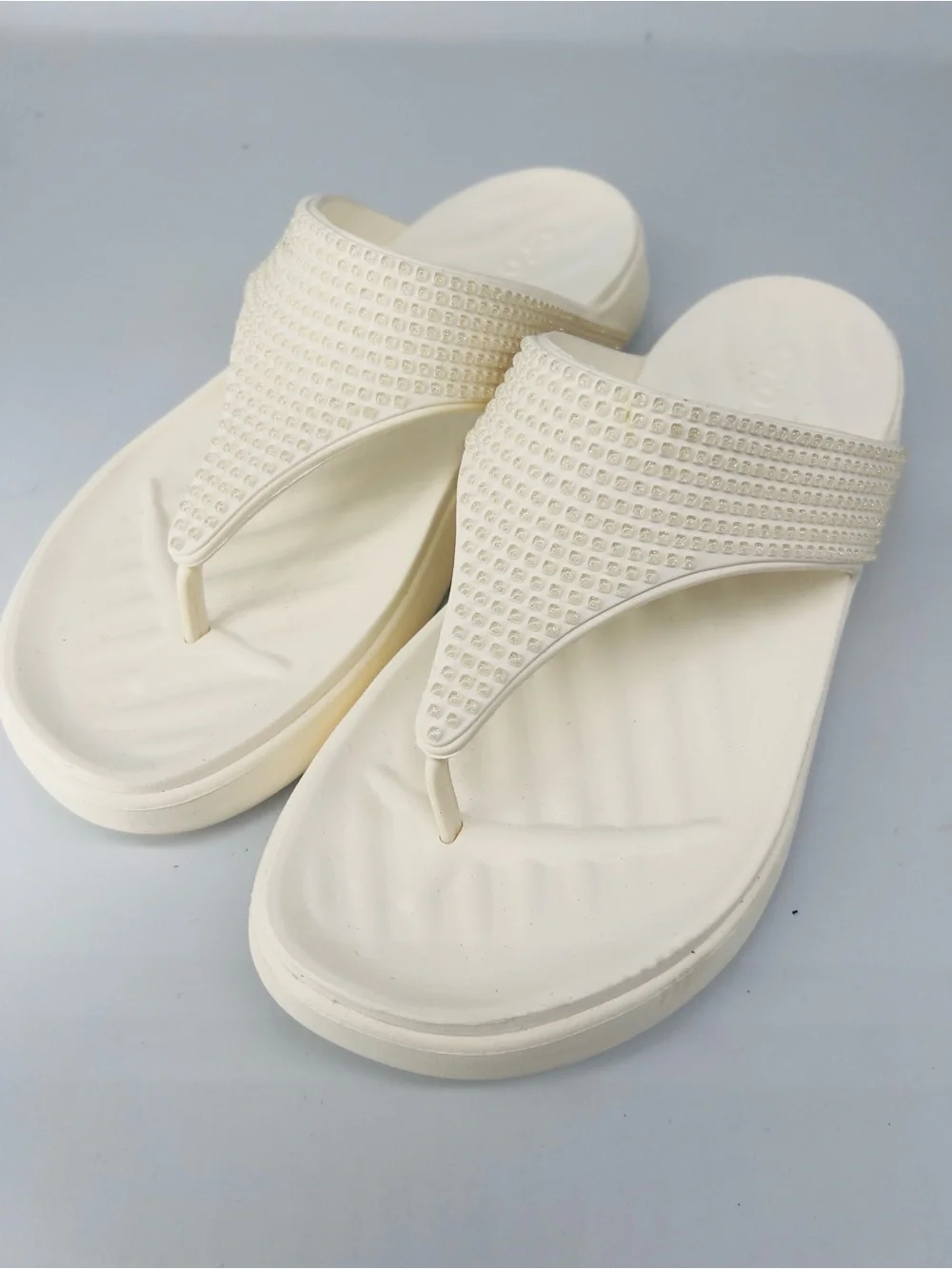 Crocs women’s getaway gems flip flops- chalk